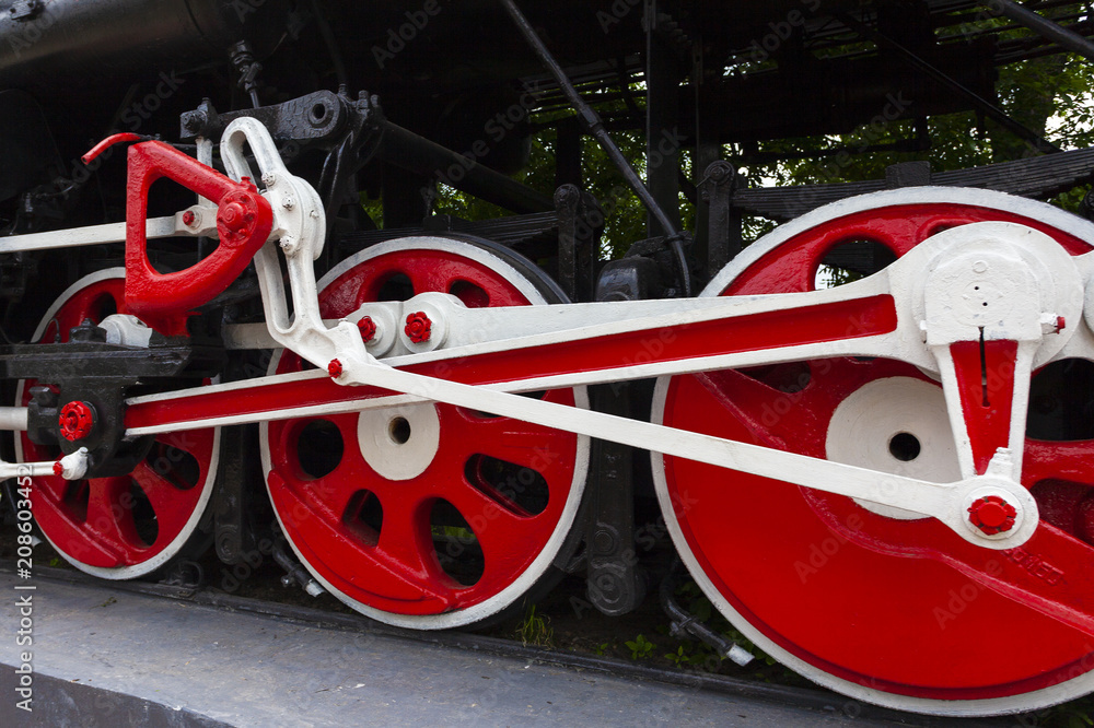 The locomotive-monument L-3291. Powerful, beautiful Russian locomotive. Wheels close-up. Steam engine