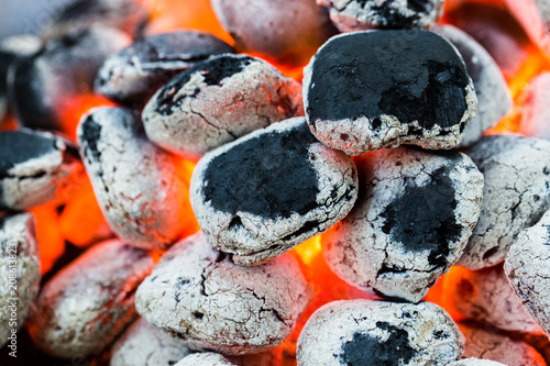 Arranged coals (selective focus) ready for barbecue