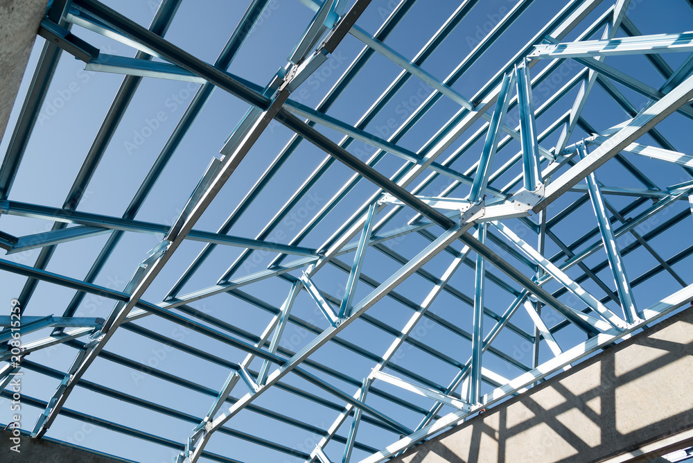 Naklejka premium Structure of steel roof frame for building construction.