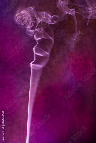 Abstract smoke on colored background.