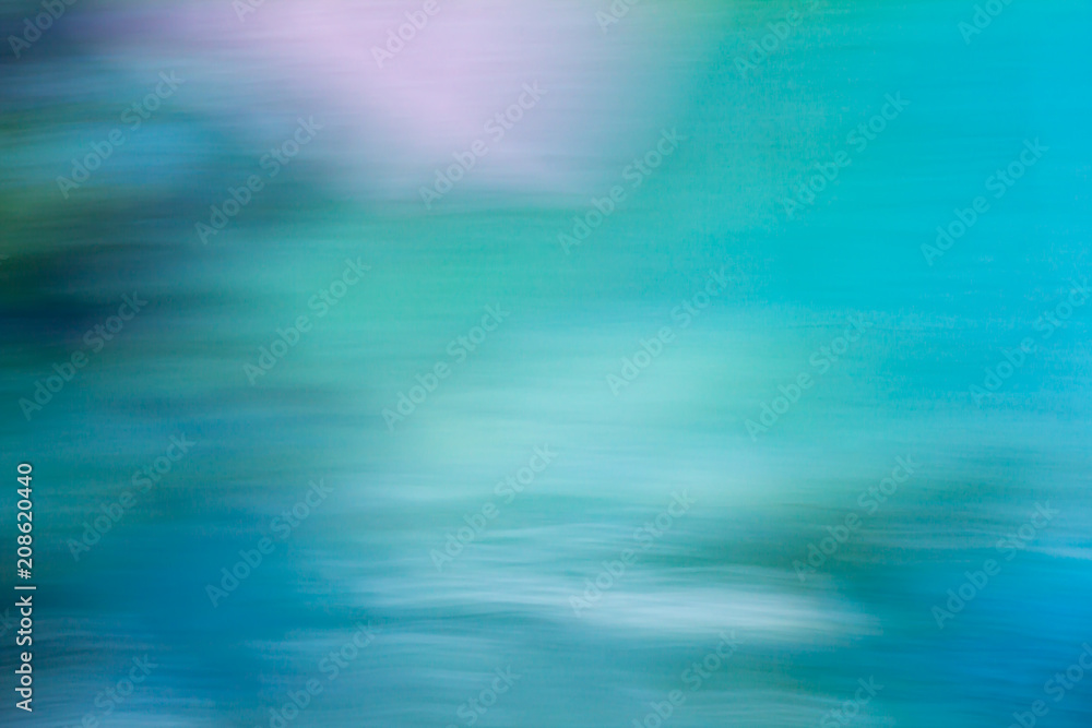Creative abstract background resembling brush or pastel painting full of dynamics in green, blue, white, etc.