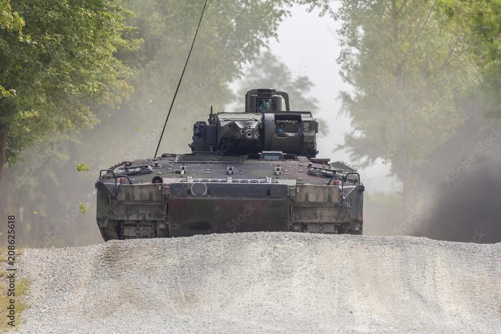 German infantry fighting vehicle drives on a street German infantry fighting vehicle drives on a street