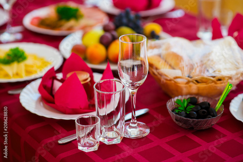 Beautiful decoration on the holiday table. red colors. photo