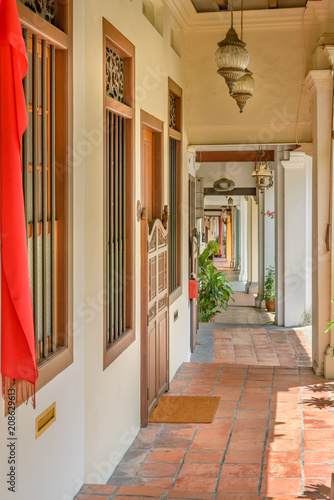Photography A covered walkway on Emerald Hill Road, a  conservation area in the colonial Chinese baroque style architecture
