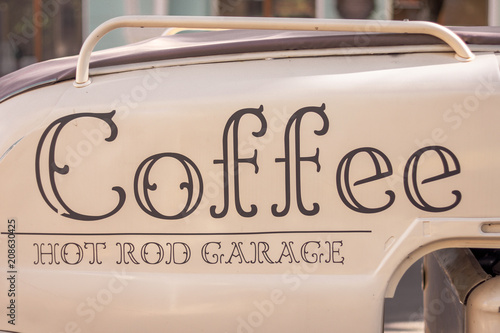 Coffee sign on the retro car