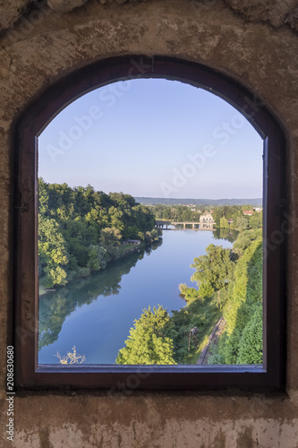 The Ozalj Hydroelectric Power Plant  built in 1908 as the first larger power plant in the continental part of Croatia view throw Ozalj castle window