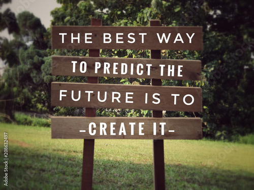 Motivational and inspirational quote - The best way to predict the future is to create it. With vintage styled background.