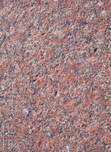 red granite background. texture, pattern, vignette.