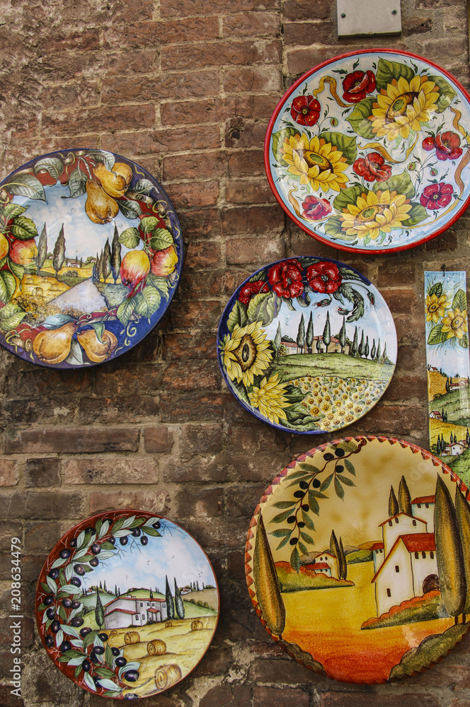 Traditional ceramic plates with views of Italy in one of the souvenir shops