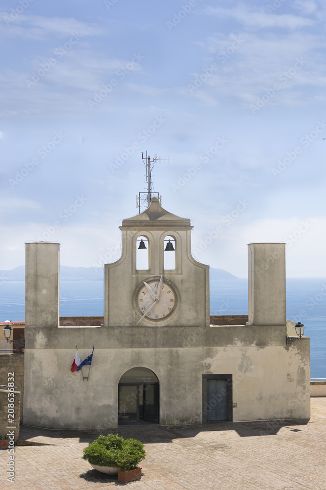 Historical church Sant't Erasmo in fortress Sant'Elmo in Naples Italy. Watch defence tower with bells and clock.