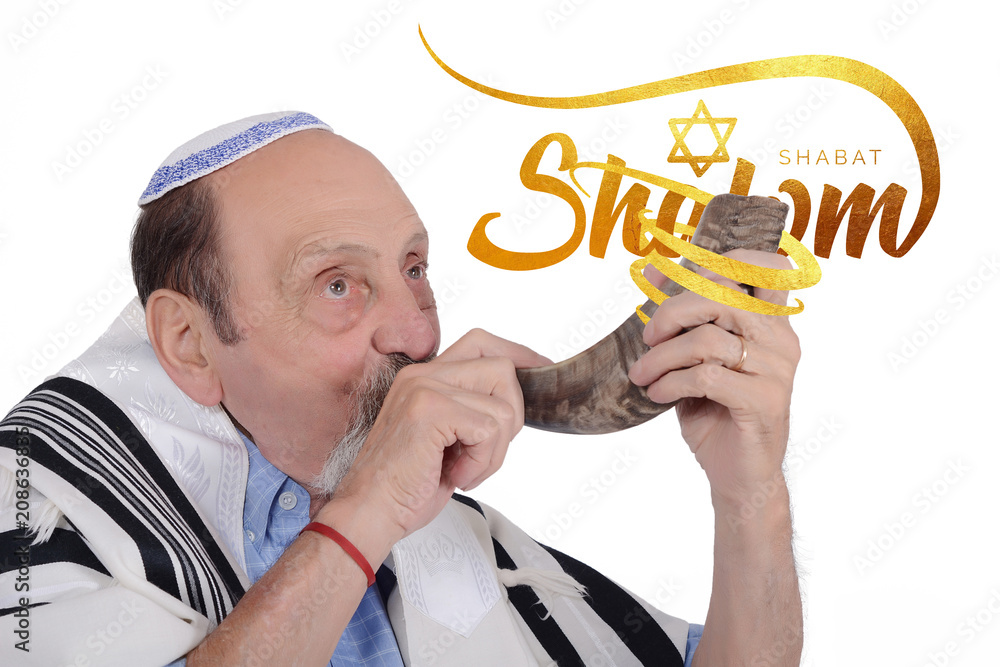 Eldery jewish man blowing the Shofar horn for Rosh Hashanah Eldery jewish man blowing the Shofar horn for Rosh Hashanah