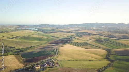 Vista aerea di un bellissimo paesaggio collinare con immensi prati e dune. Val D'Orcia in Toscana  photo