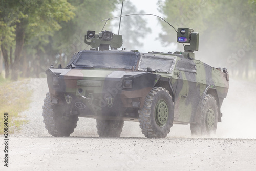 German light armoured  reconnaissance vehicle drives on a road