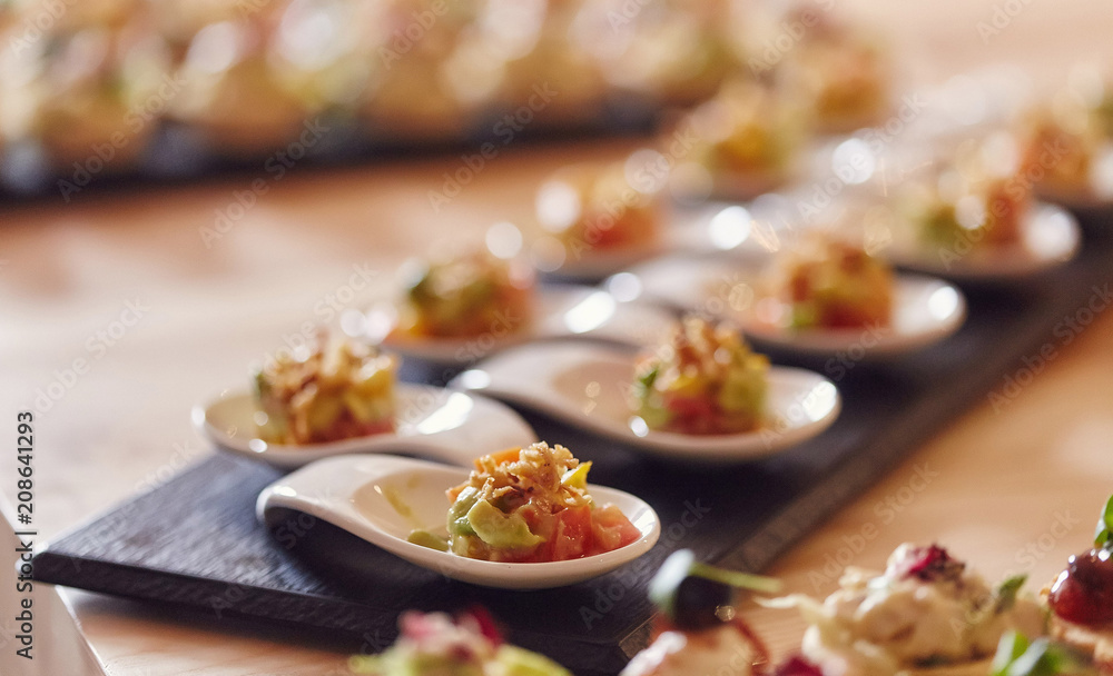 Close-up image of a festive table with different dishes. Close-up image of a festive table with different dishes.