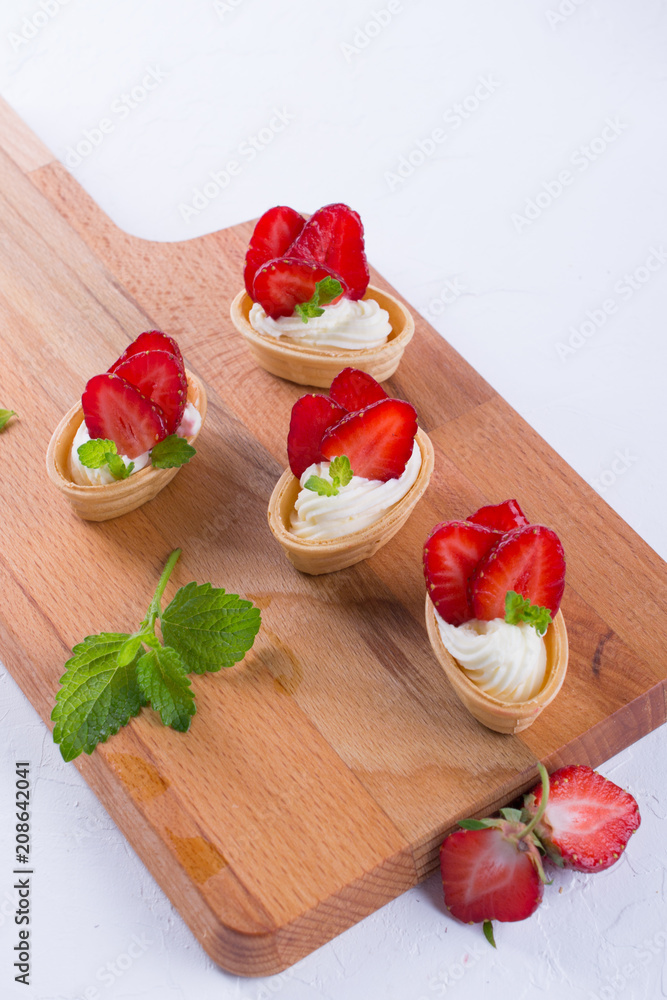 Fresh and tasty snack with cream cheese fruits and berries. Strawberries time Fresh and tasty snack with cream cheese fruits and berries. Strawberries time