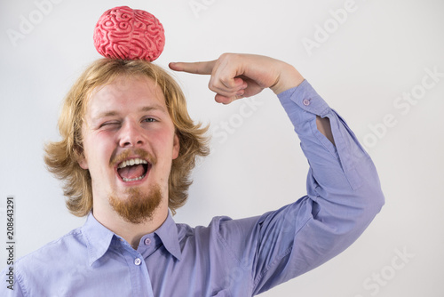 Man playing with human brain