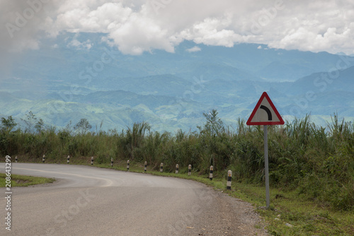 Roadside traffic sign at tropical mountains