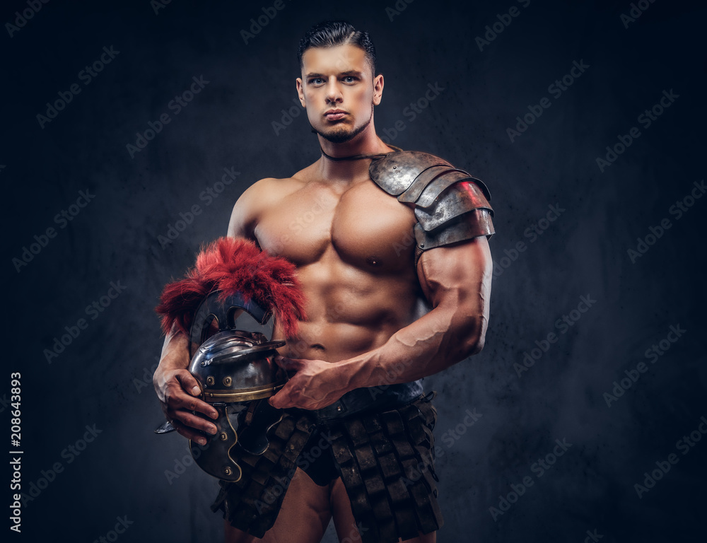 Brutal ancient Greece warrior with a muscular body in battle uniforms ...