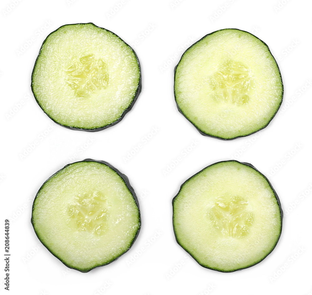 Cucumber slices isolated on white background, top view Cucumber slices isolated on white background, top view