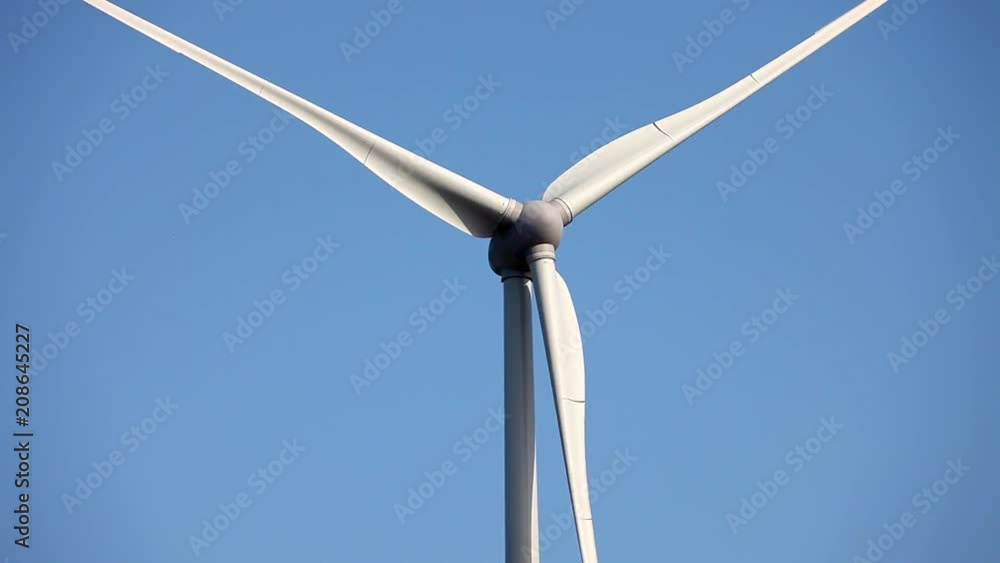 Wind turbines create renewable energy. Ecology green concept Wind turbines create renewable energy. Ecology green concept