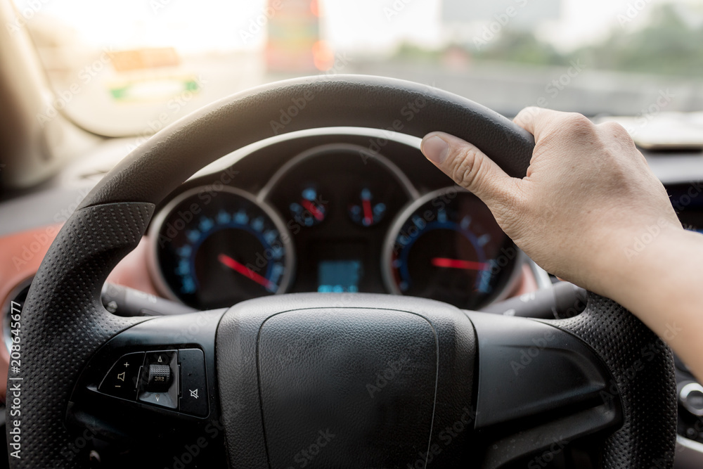 Always on the move. Close-up of hands on steering wheel Always on the move. Close-up of hands on steering wheel