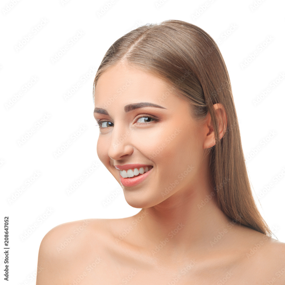 Obraz premium Happy young woman with a beautiful smile