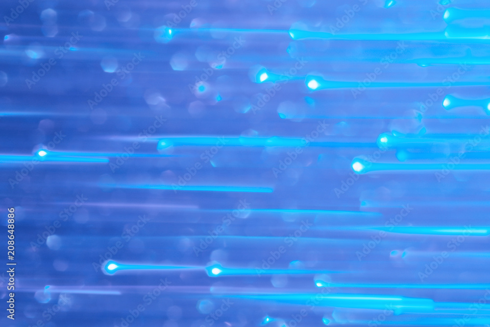The distribution of light is a blue moving line that goes straig The distribution of light is a blue moving line that goes straig