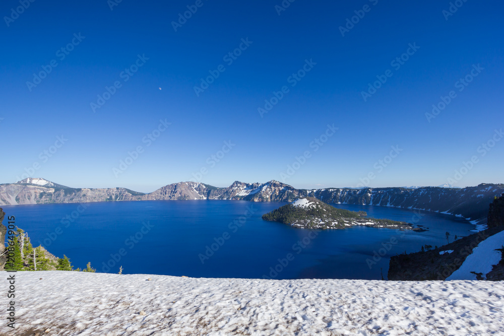 Beautiful scenery of Crater Lake and Wizard Island in summer as seen from the north rim, Oregon, USA