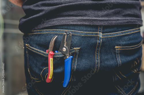 tool kit in jean pocket