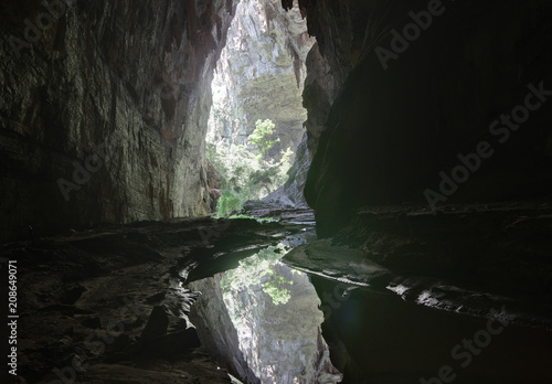 A river runs under a giant cave in southeast Brazil