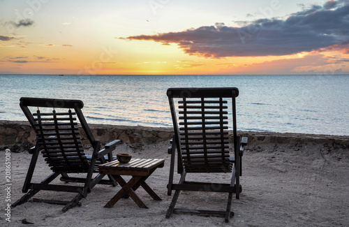 Wooden Beach Chairs overlooking sunset at Holbox Island, Mexico