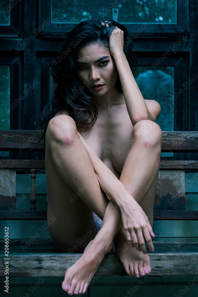 Sexy Tanned Asian Girls - Beautiful Asian girl She bare body sitting on a wooden chair. She is  looking at you with sexy and beautiful eyes. She is a woman with tan.  concept nude. Stock Photo |