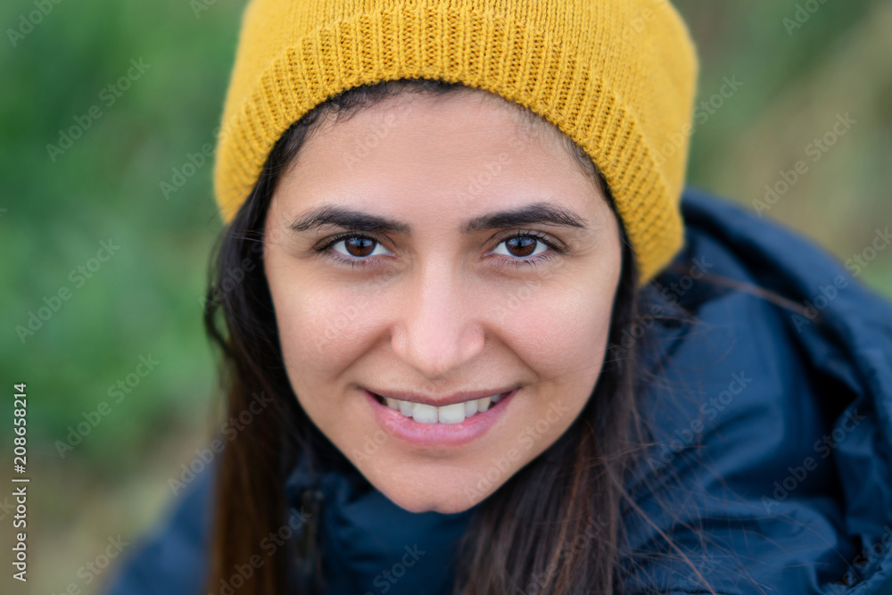 Young beautiful brunette woman smiling with yellow beret Young beautiful brunette woman smiling with yellow beret