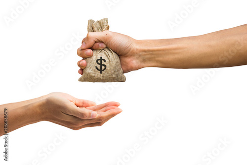 Man hand holding money bag and giving money to another person isolated on white background with clipping path easy to use for design your work. photo