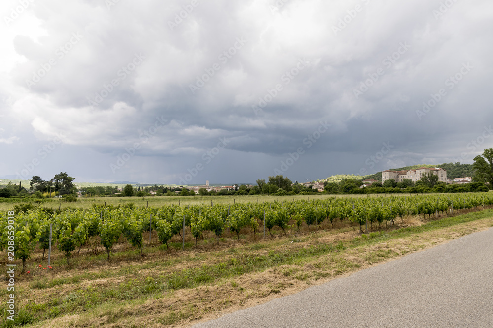 stormy weather over the panorama of a village of france