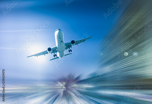Airplane with blur abstract background © JackF