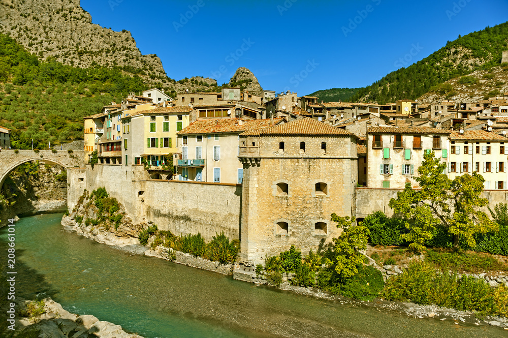 Set on both sides of the narrow road between Annot and Puget-Théniers that runs alongside the gorge of the river Var, the medieval walled town  Entrevaux lies in the shadow of a mountaintop citadel.