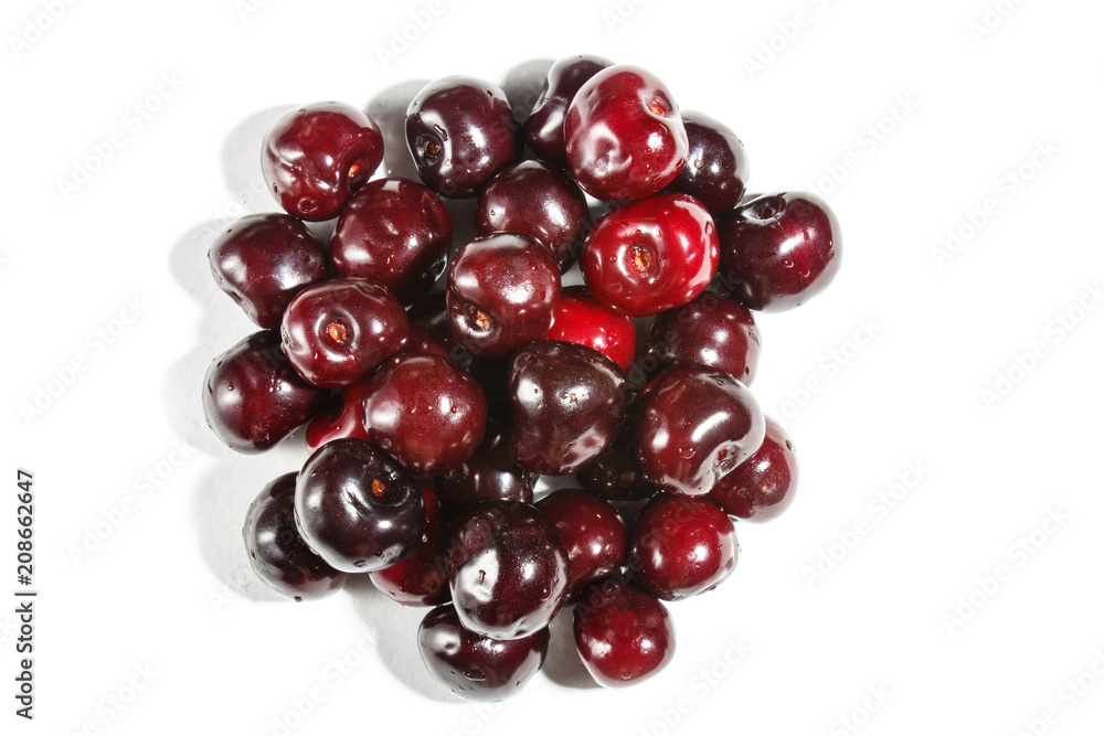 Pile of sweet cherry isolated on white background. Pile of sweet cherry isolated on white background.