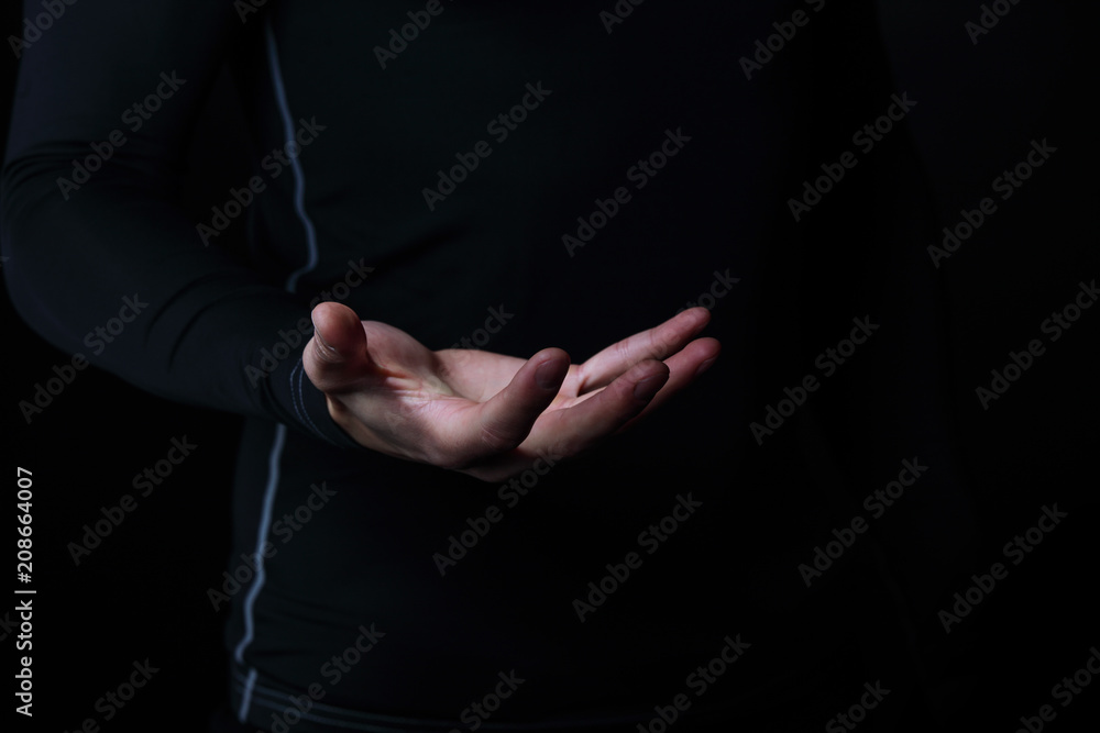 Hand holding abstract glowing object
