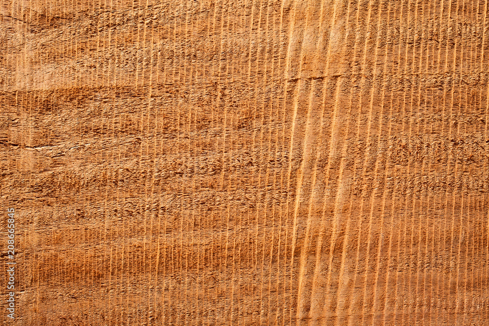 Wooden texture with traces of the saw for background. Wooden texture with traces of the saw for background.