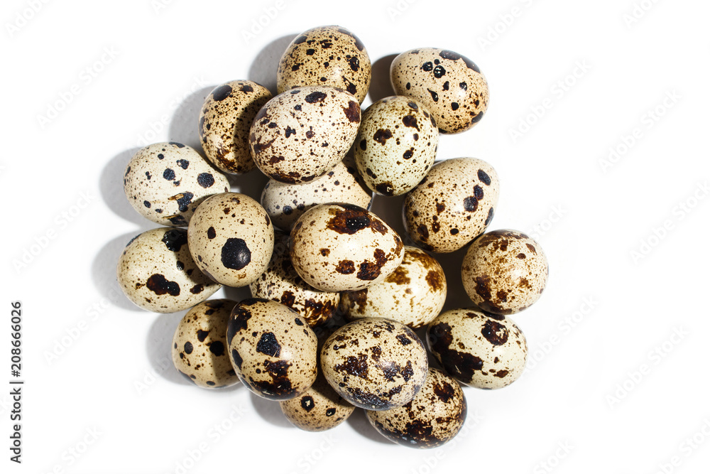 Pile of quail eggs isolated on white background. Pile of quail eggs isolated on white background.