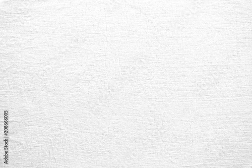 White grunge canvas background. White linen fabric texture. Abstract woven surface.