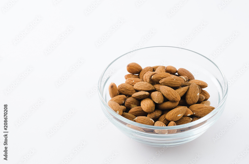 Almonds in a glass bowl Almonds in a glass bowl