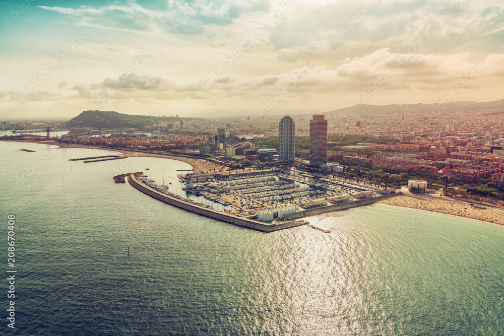 Fototapeta premium Barcelona aerial, Port Olimpic with boats and city skyline, Spain. Vintage colors
