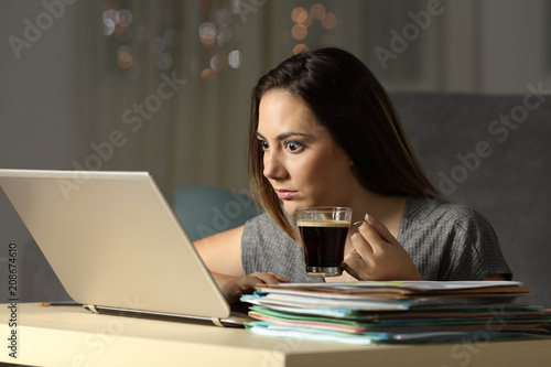 Fotografija Excited entrepreneur working hard late hours