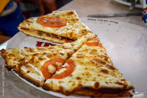 Pizza slices at restaurant 