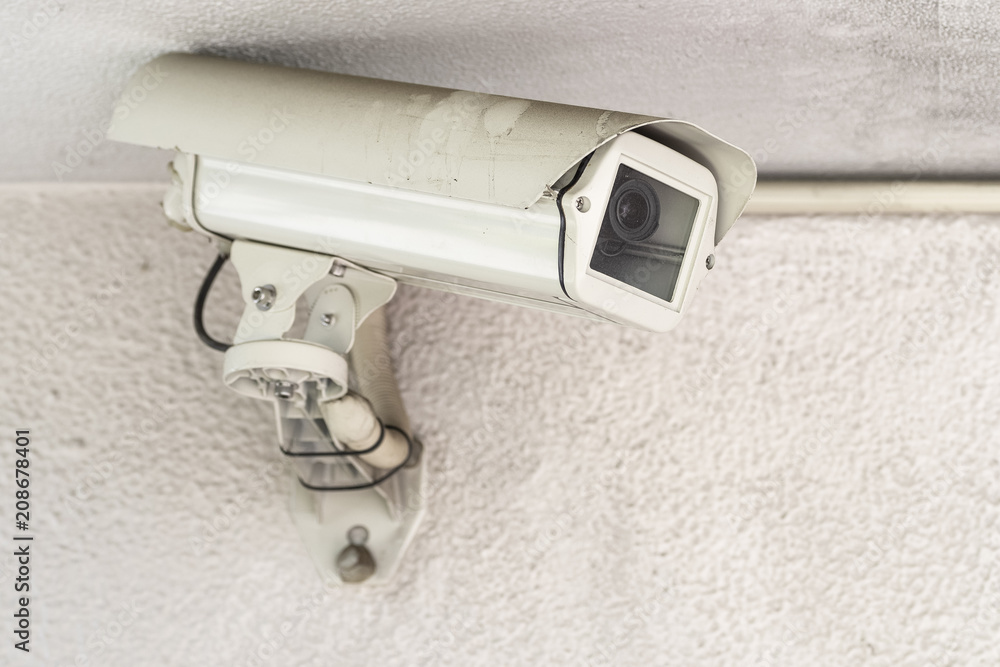 CCTV camera security on building wall CCTV camera security on building wall
