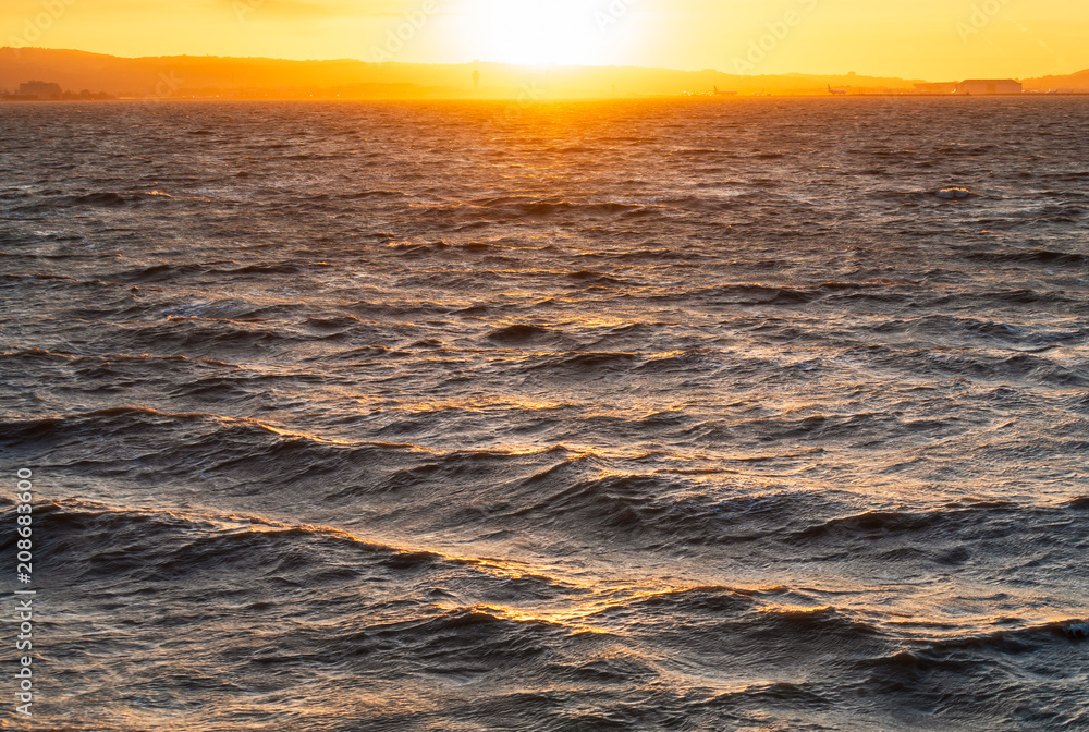 High Winds Over the Ocean at Sunset