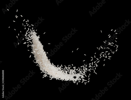 Stop motion white rice splash or explode flying in the air  isolated on black background food object design