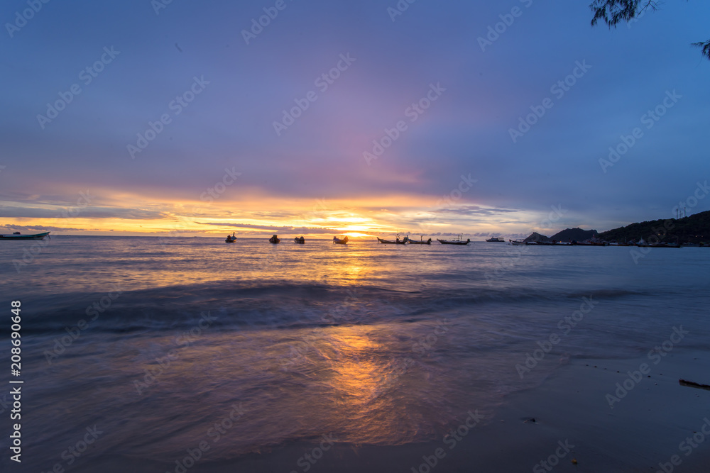 Fototapeta premium seascape and sunset twilight times at beach smooth reflections by wide angle lens